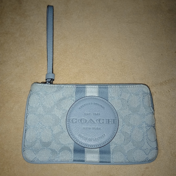 Coach Handbags - SOLD Coach Dempsey Large Corner Zip wristlet With Patch and Stripe